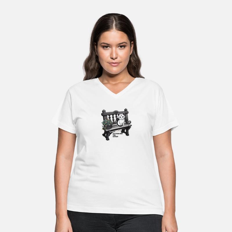 A cozy kitten and a colorful pot