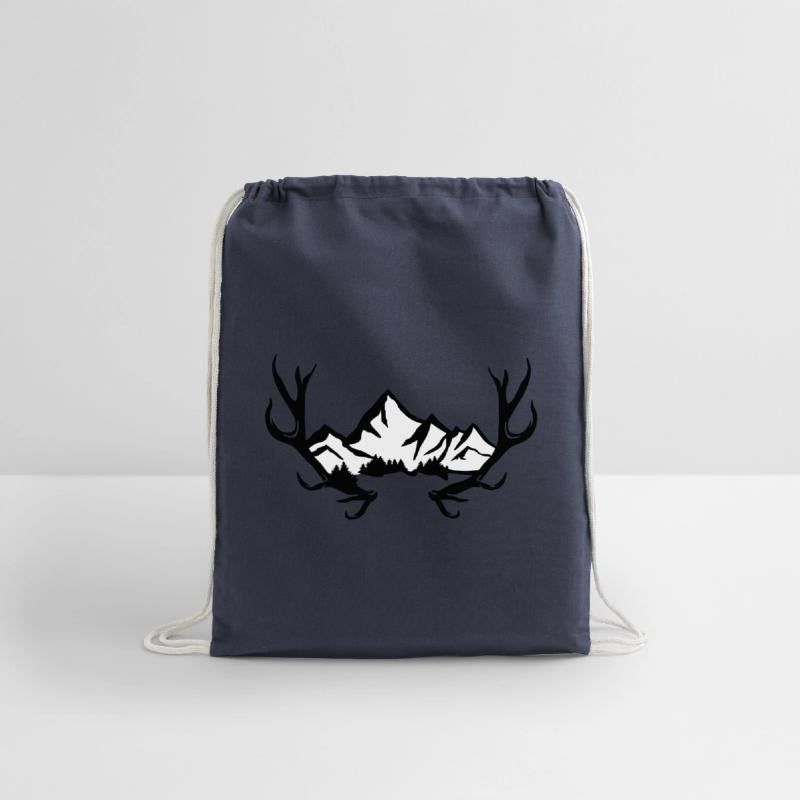 Deer antlers, snowy mountains and forest