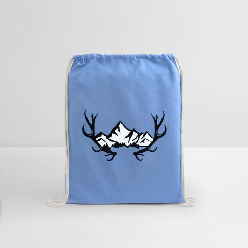 Deer antlers, snowy mountains and forest